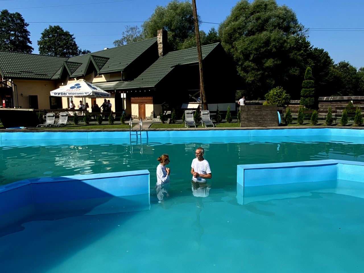 Ukrainian Woman Being Baptised