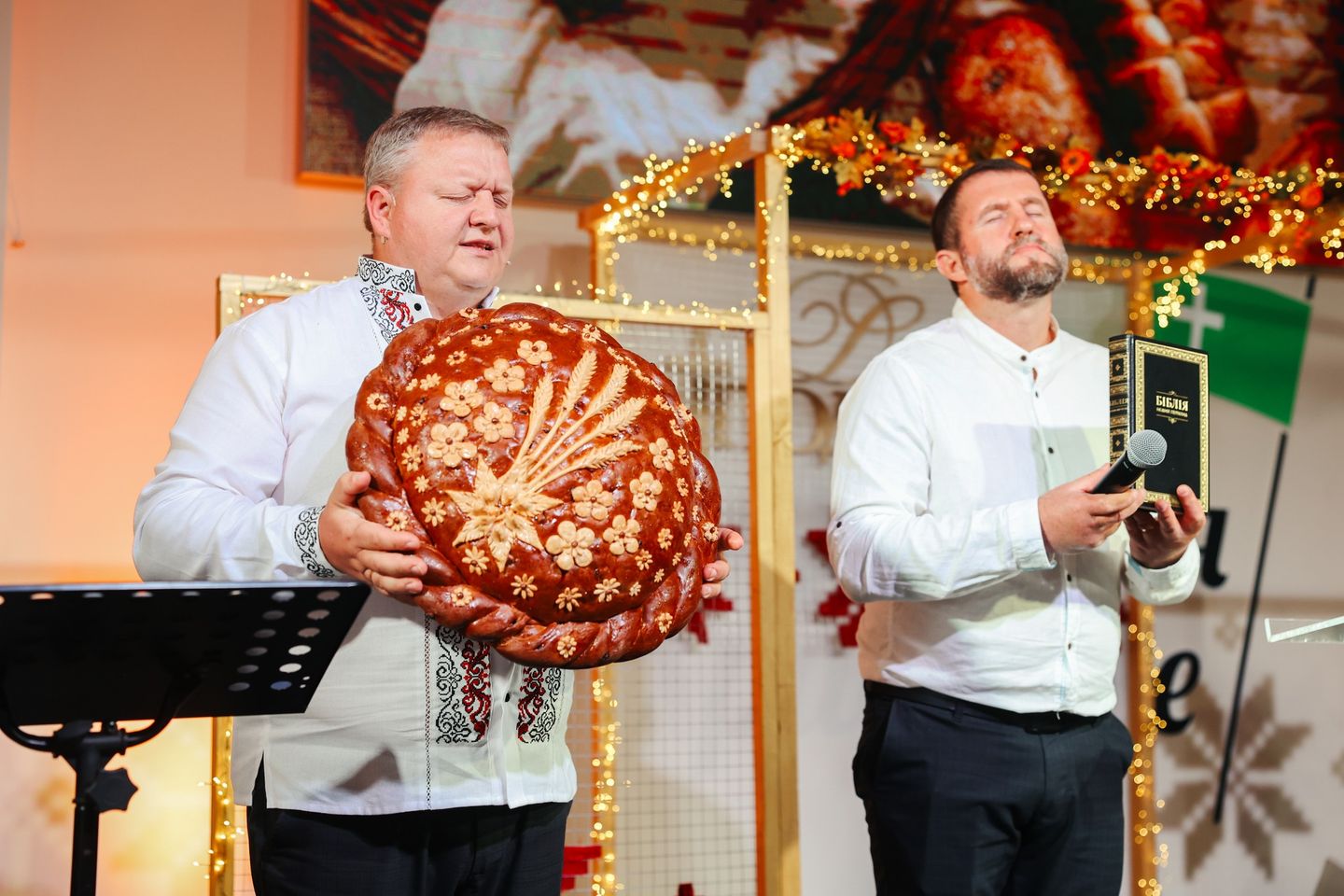Pastor With Ukrainian Traditional Bread On Harvest Day Pastor With Ukrainian Traditional Bread On Harvest Day