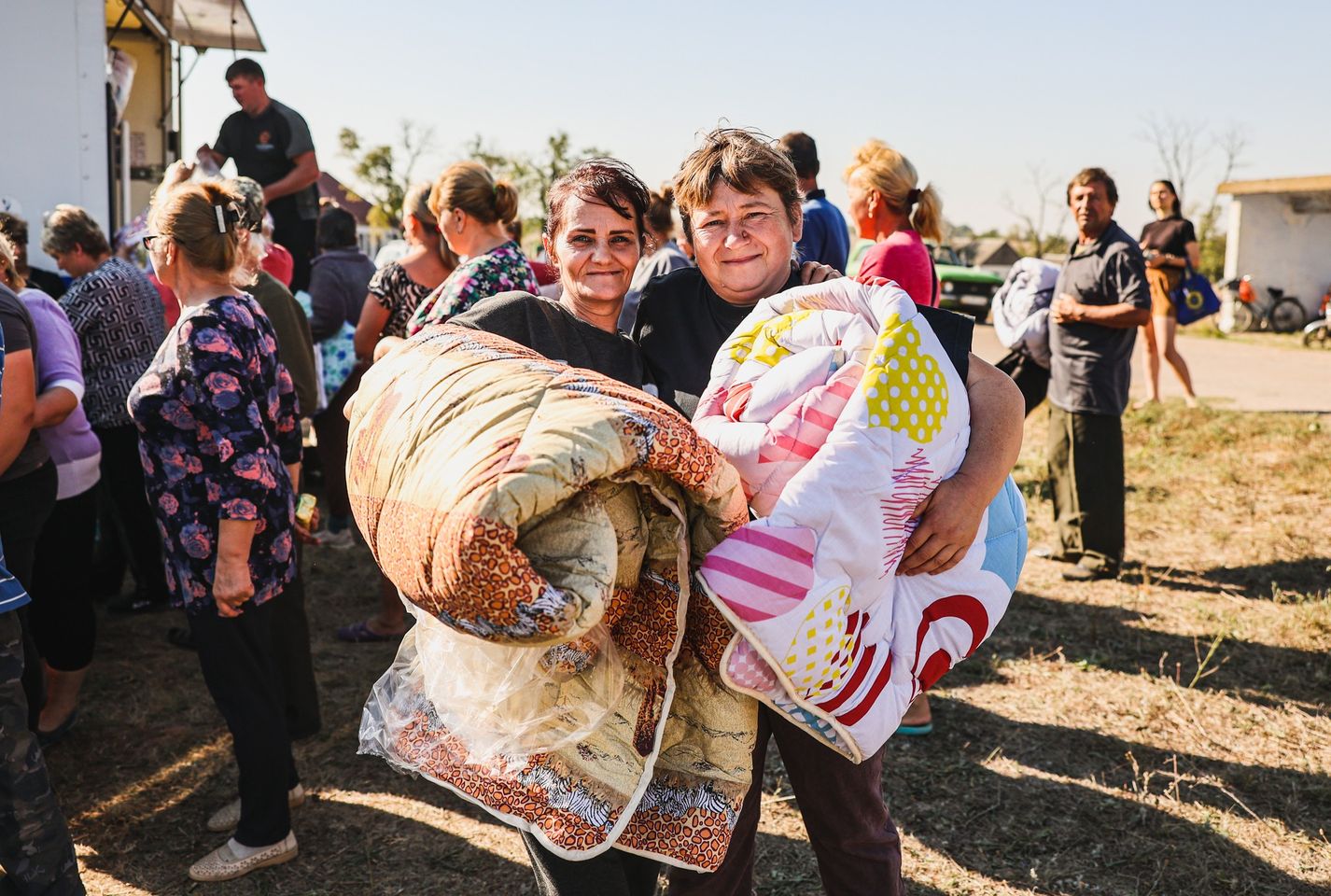 Ukrainian Women Hold Bedding Brought By Volunteers Oct Ukrainian Women Hold Bedding Brought By Volunteers Oct