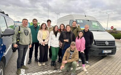 Volunteers come to recently liberated Izum with humanitarian aid and to entertain children