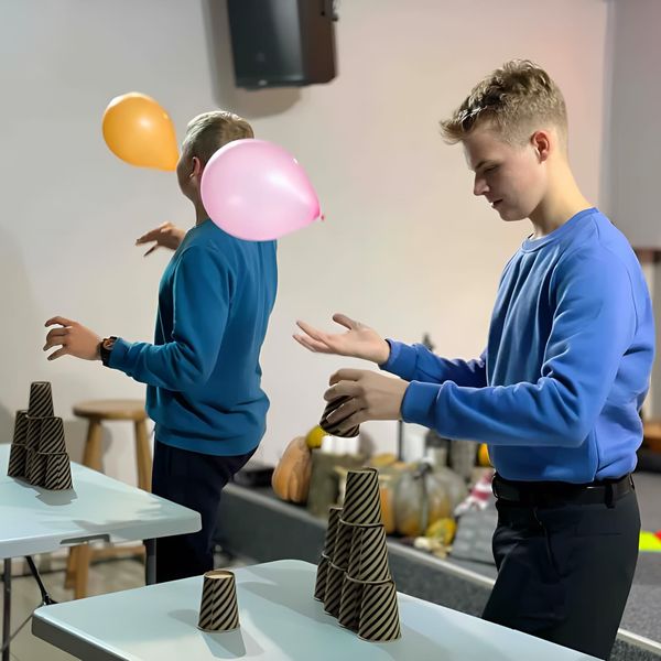 Two Boys Playing A Game At Youth Group Two Boys Playing A Game At Youth Group