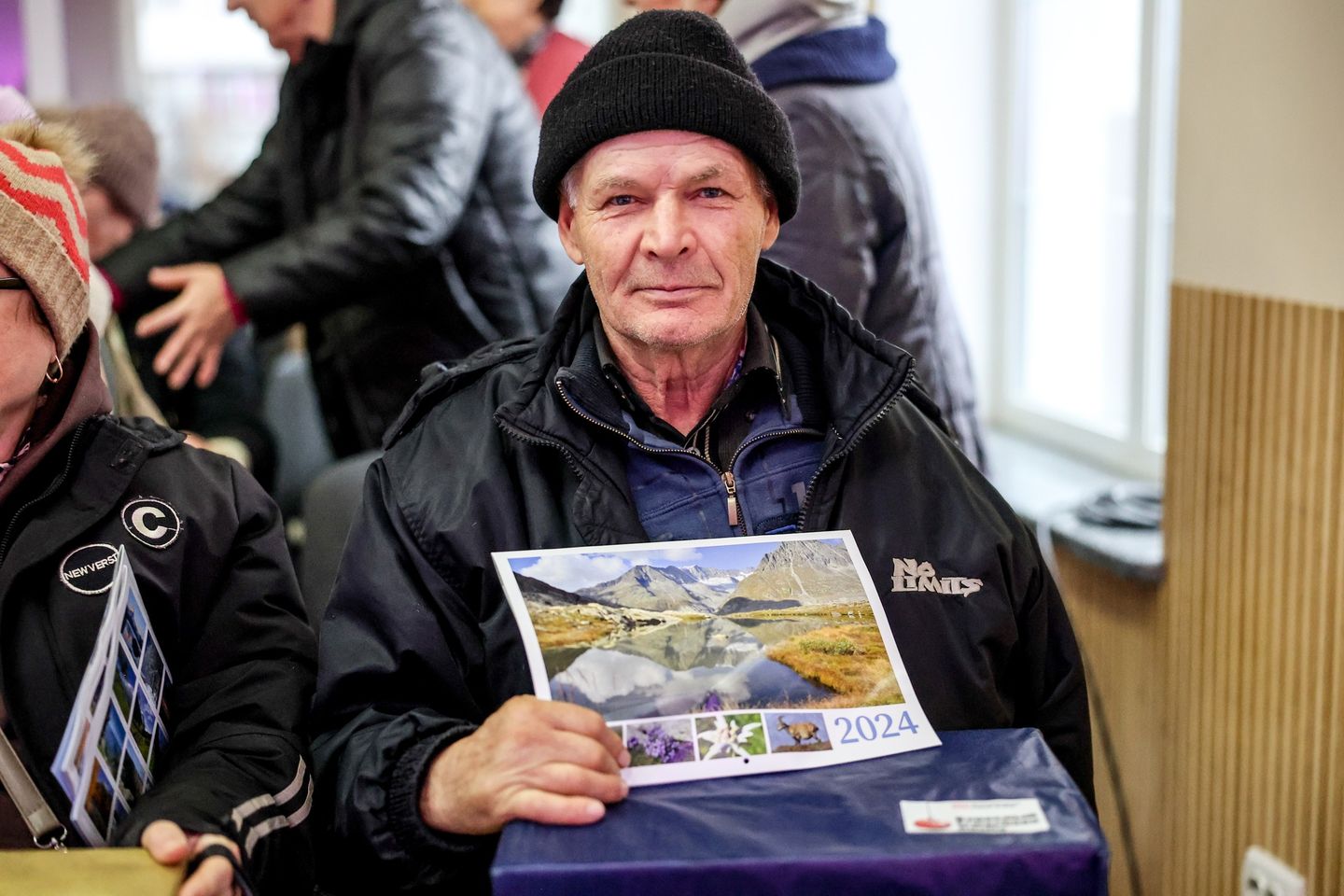 Ukrainian Grandpa Holds Up Calendar Gifted To Him Ukrainian Grandpa Holds Up Calendar Gifted To Him