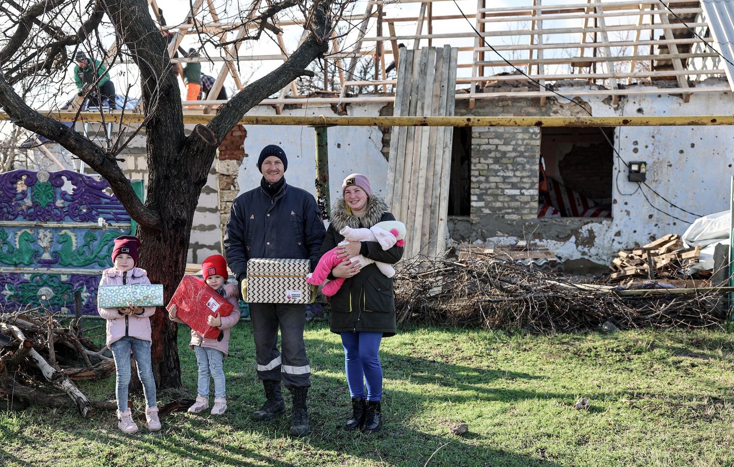 Ukrainian Family In Front Of Their Home Being Reconstructed Jan Ukrainian Family In Front Of Their Home Being Reconstructed Jan
