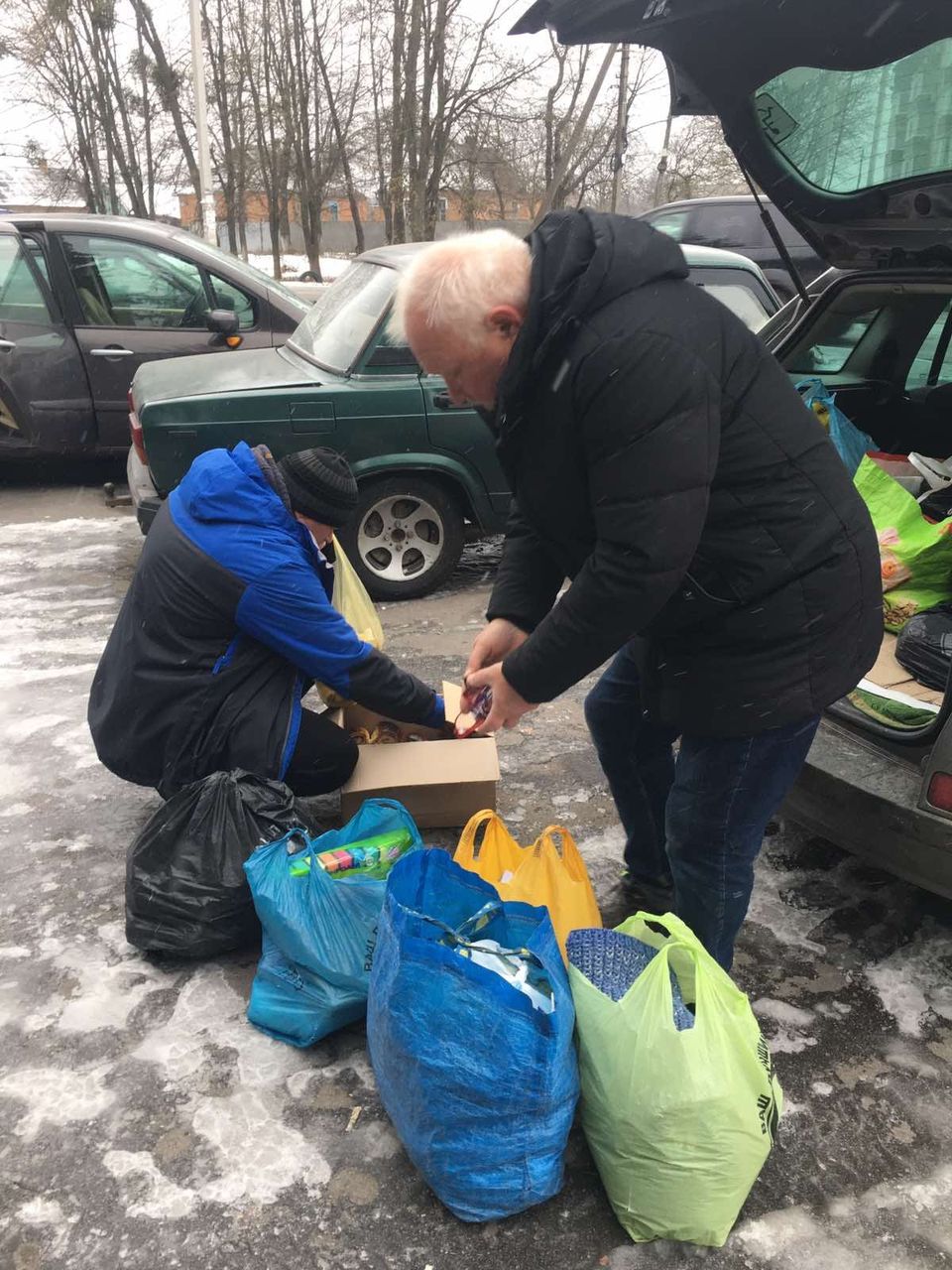 Volunteers Carrying Food For The Prison Ministry Volunteers Carrying Food For The Prison Ministry