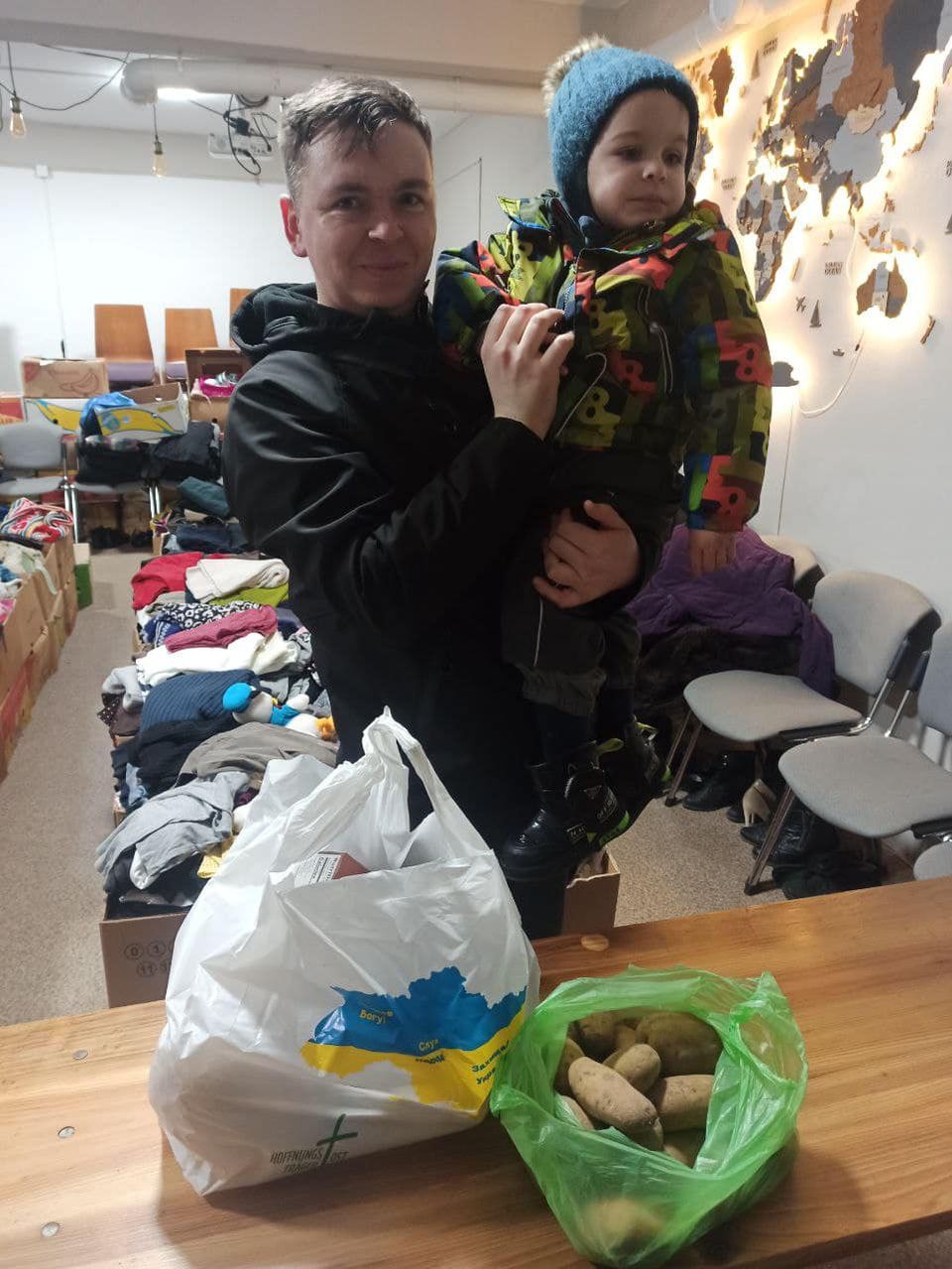 A Ukrainian Father With His Young Son To The Humanitarian Hub In Uman A Ukrainian Father With His Young Son To The Humanitarian Hub In Uman