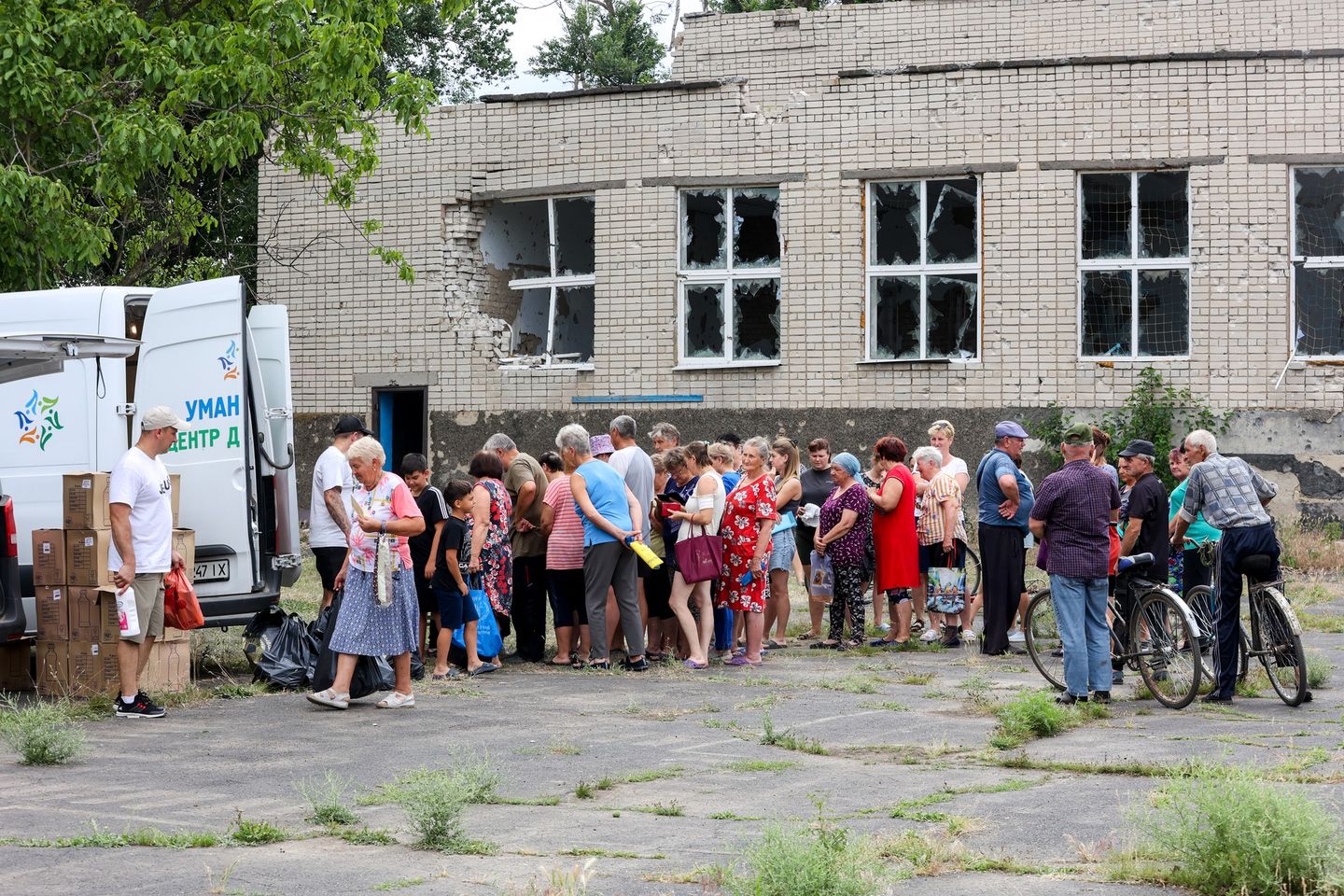 A Line Of People During Humanitarian Aid Distribution In Ukraine A Line Of People During Humanitarian Aid Distribution In Ukraine