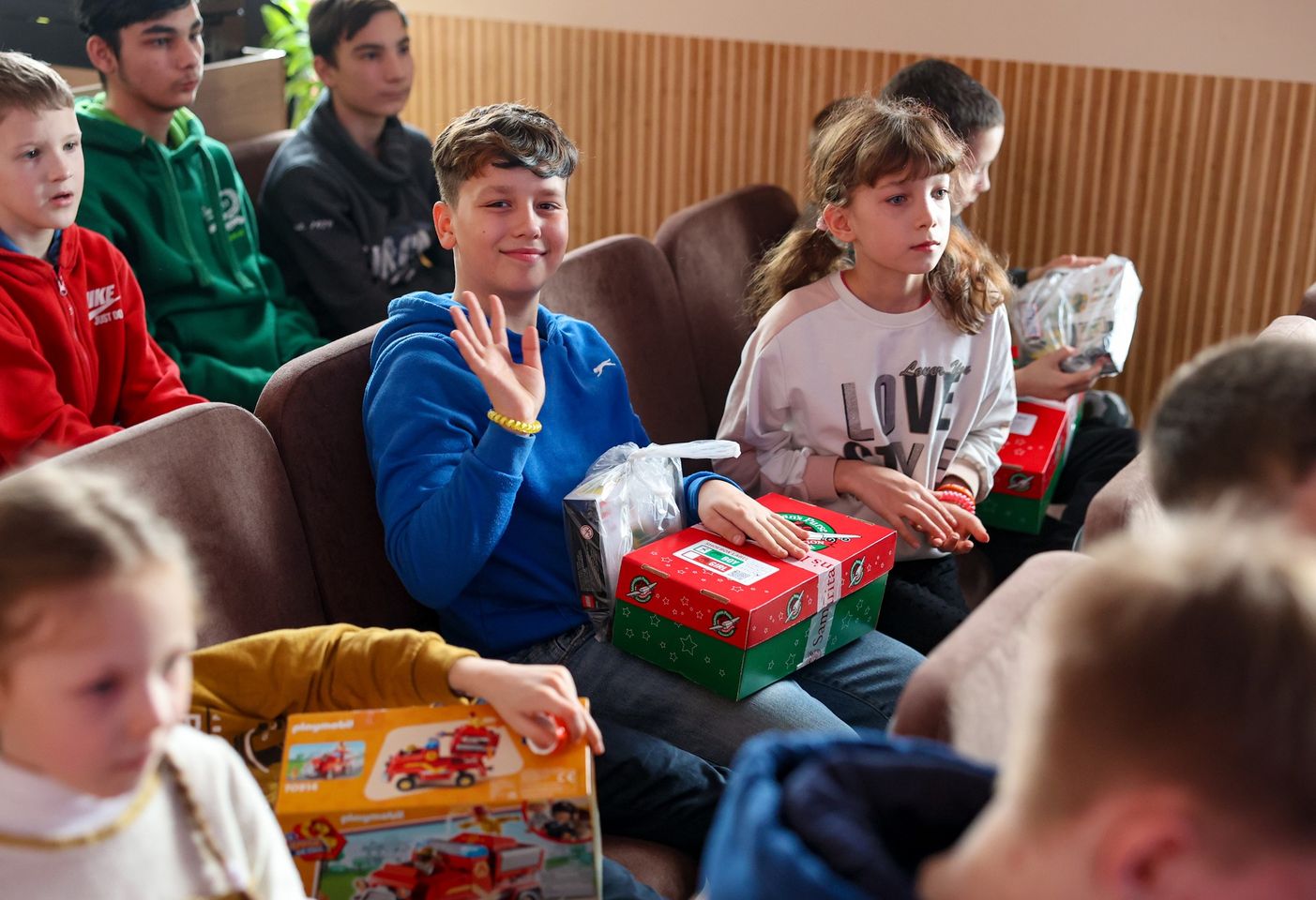 Ukrainian Boy Sitting With A Gift During Kids Club In Uman Ukrainian Boy Sitting With A Gift During Kids Club In Uman