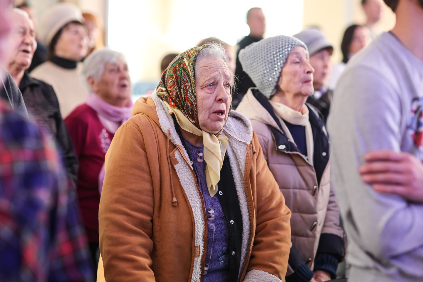 Ukrainian Elderly Woman Singing During A Worship Service Ukrainian Elderly Woman Singing During A Worship Service