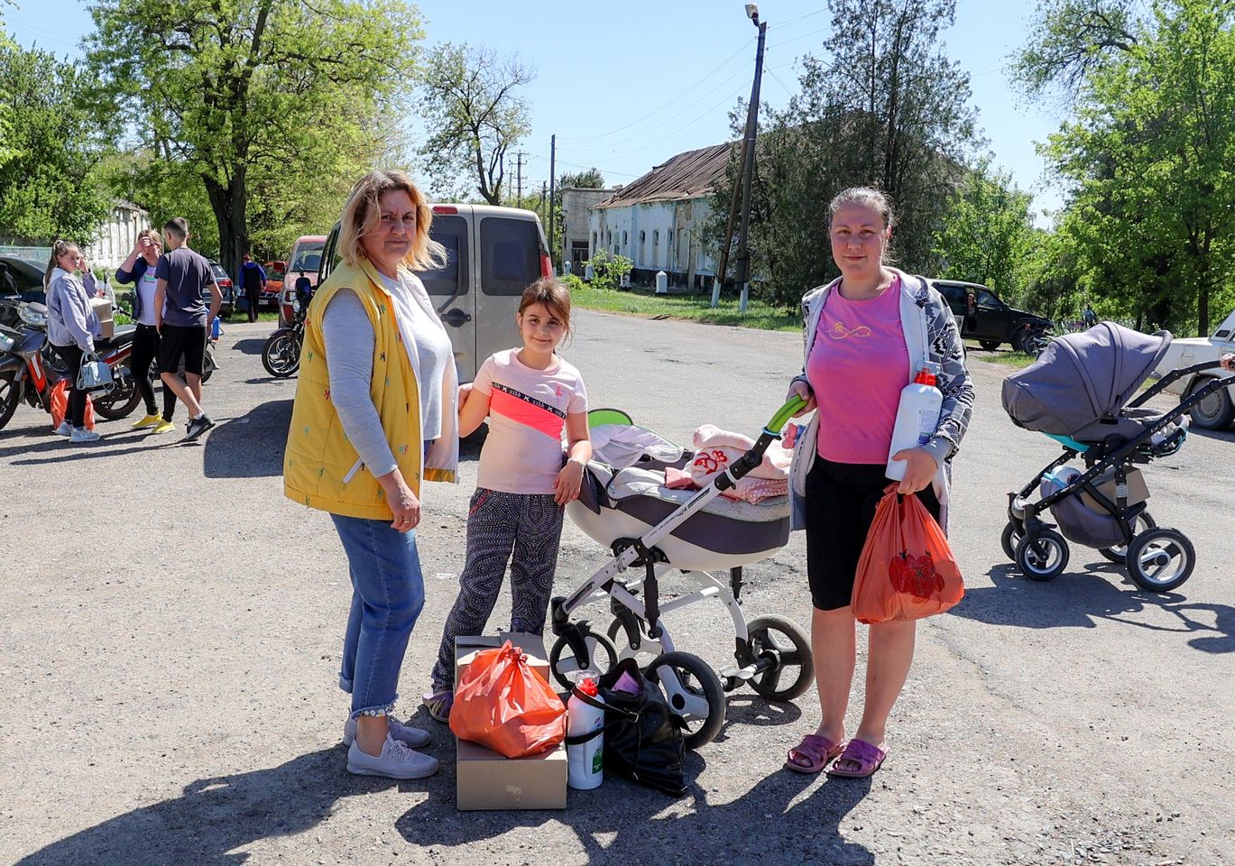 Ukrainian Family With Humanitarian Aid In Kherson Ukrainian Family With Humanitarian Aid In Kherson