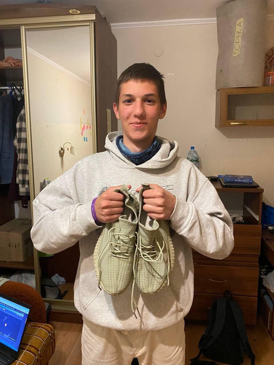 Ukranian Teenage Boy With His New Shoes Ukranian Teenage Boy With His New Shoes