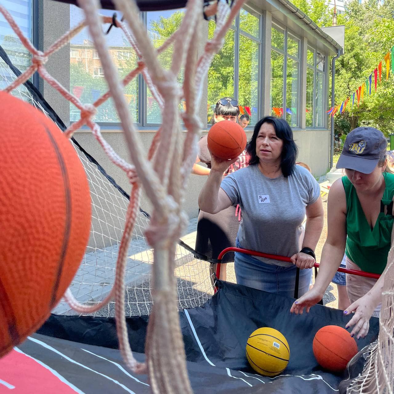 A Couple Ukrainian Mothers Playing Arcade Basketball A Couple Ukrainian Mothers Playing Arcade Basketball