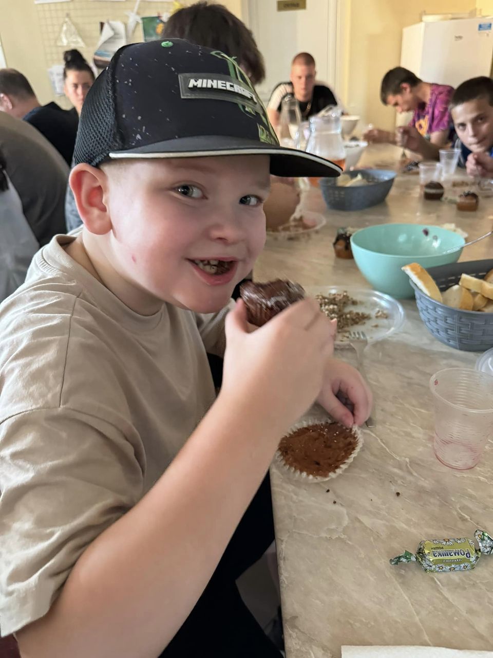 Boy From Donetsk Enjoying A Meal