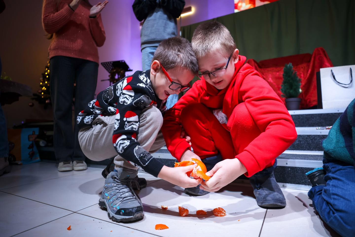 Ukrainian Boys Peeling An Orange Ukrainian Boys Peeling An Orange