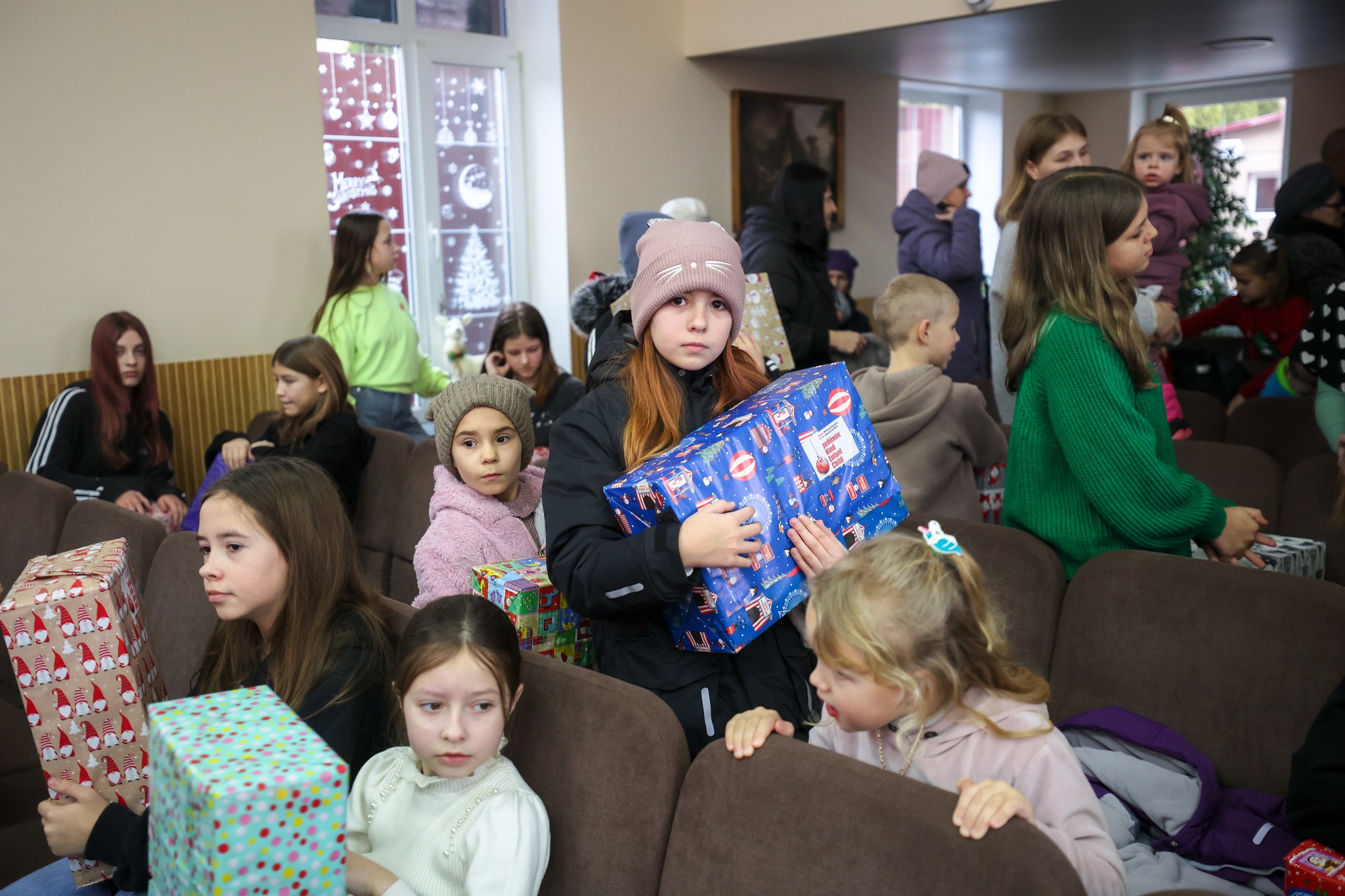 Ukrainian Girl Holding A Present During An Event Ukrainian Girl Holding A Present During An Event