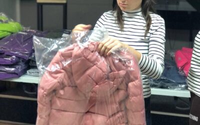 Uman distributes winter clothing