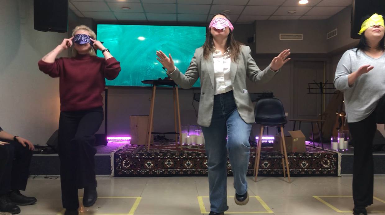 Volunteers Playing A Blindfolded Game Volunteers Playing A Blindfolded Game