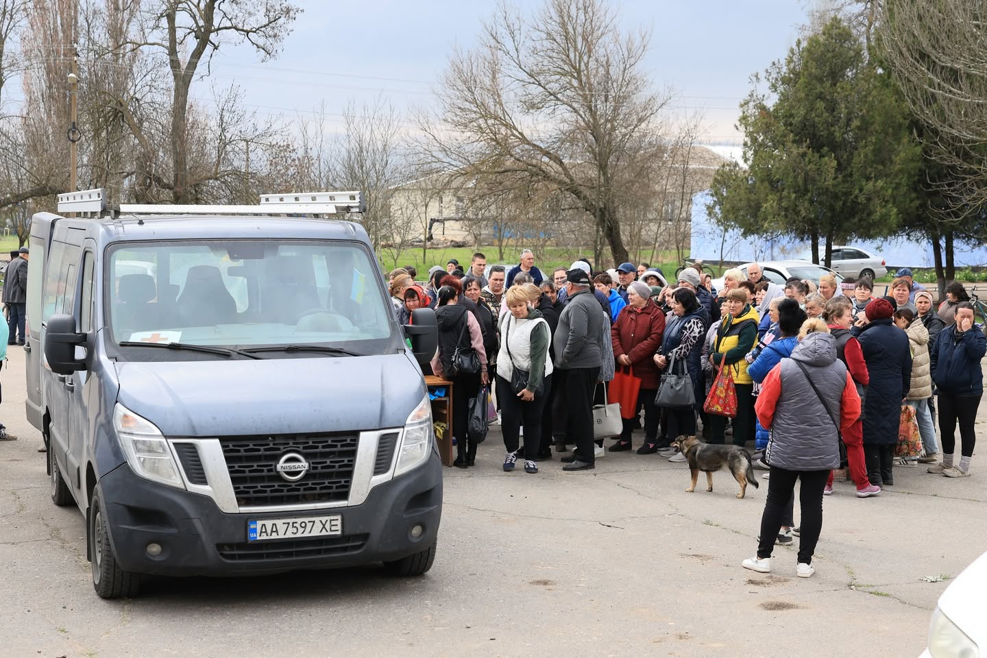 Locals In Kherson Gather Around Vans With Aid Locals In Kherson Gather Around Vans With Aid