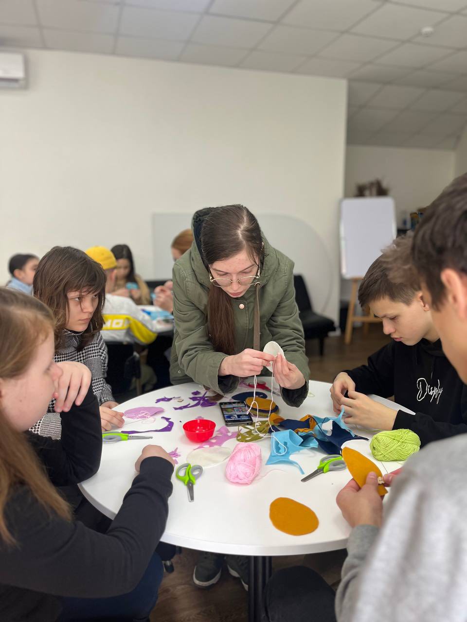 Woman Explaining Somethig To Children April Th