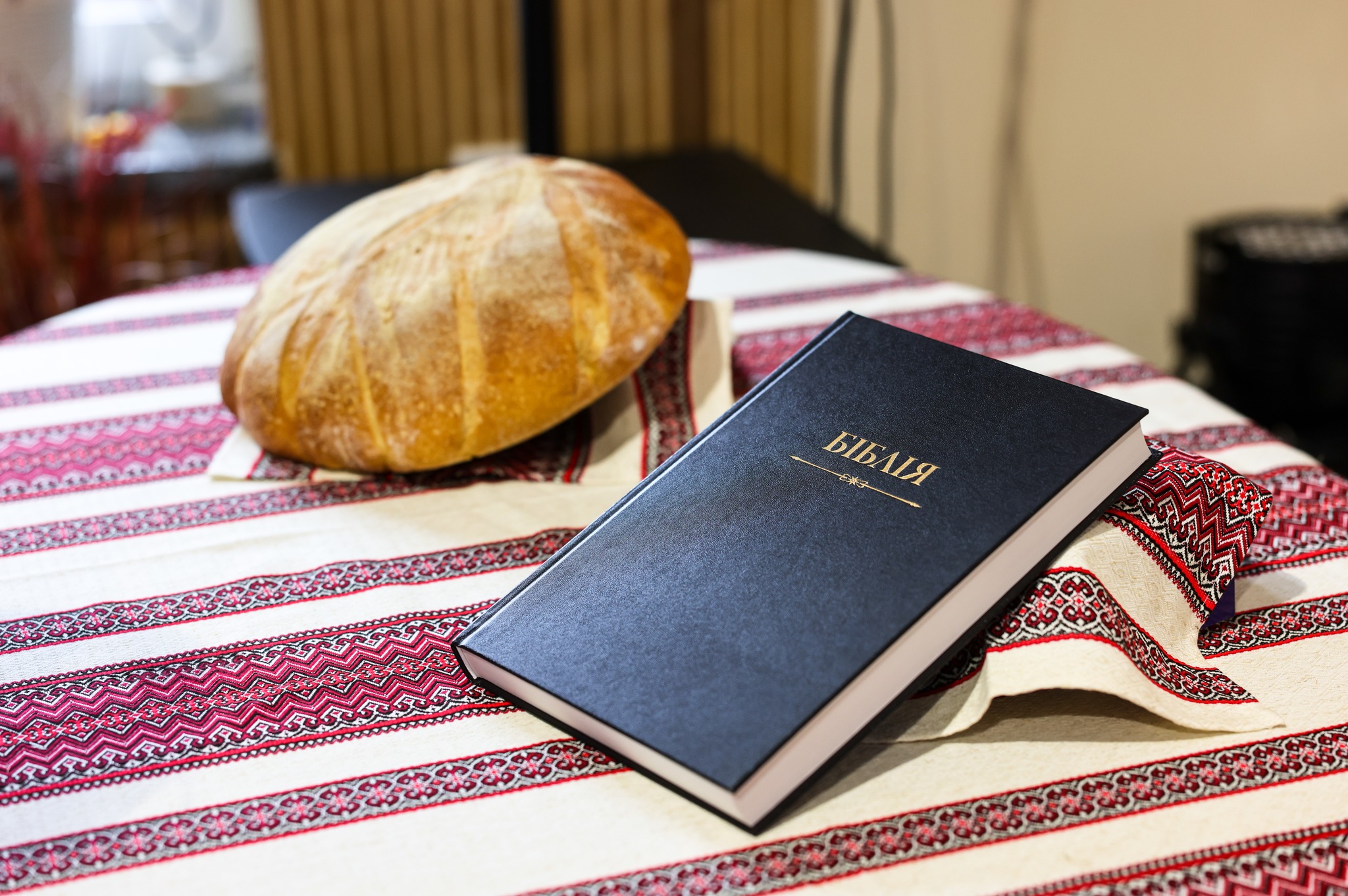 A Bible And Bread On A Table A Bible And Bread On A Table