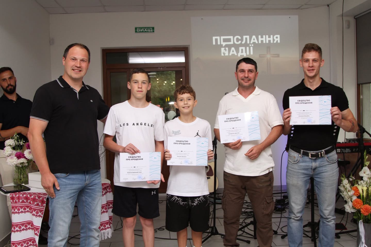 Parishioners With Their Certiface Of Baptism