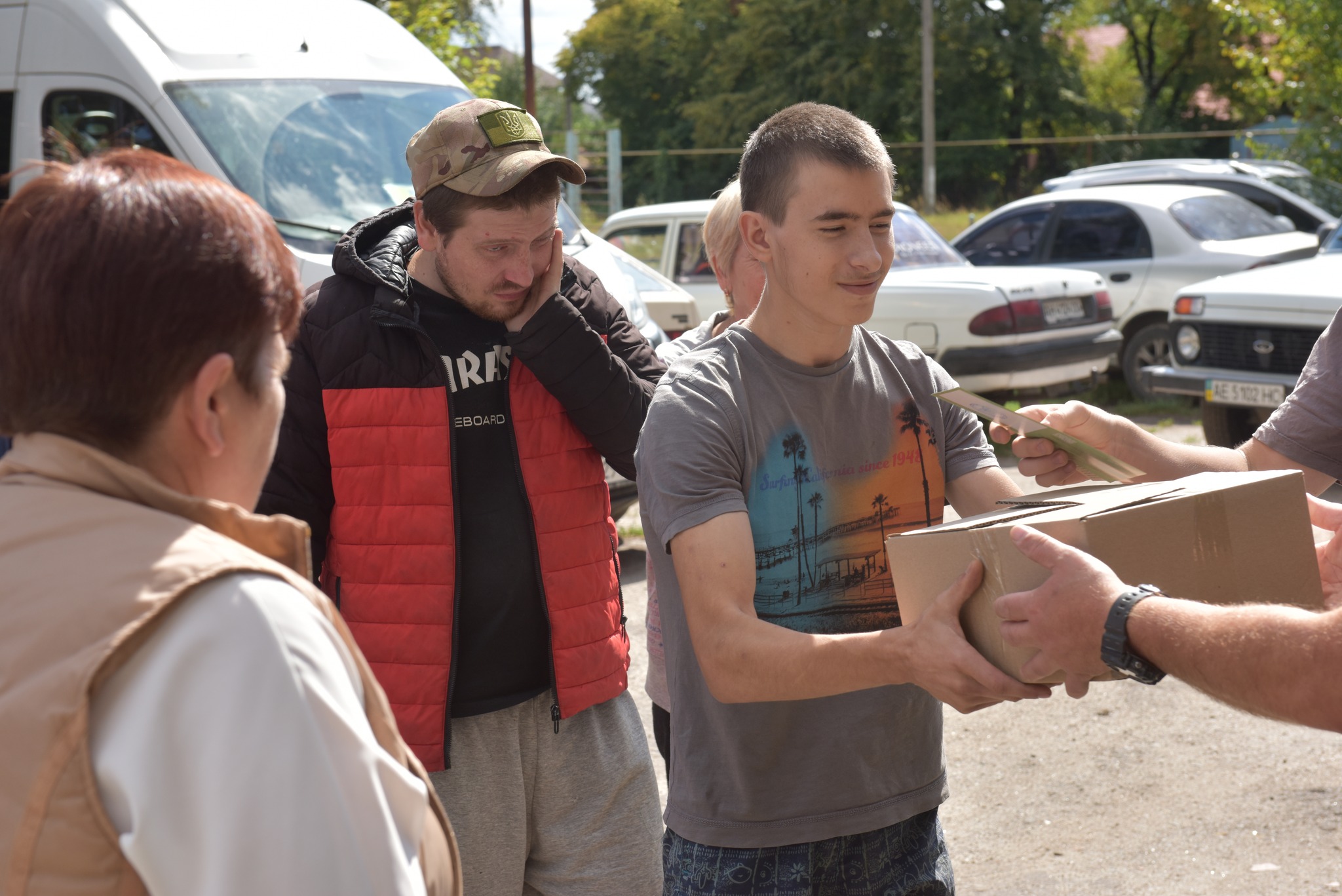 Ukrainian Man Receieving A Box Of Humanitarian Aid Ukrainian Man Receieving A Box Of Humanitarian Aid