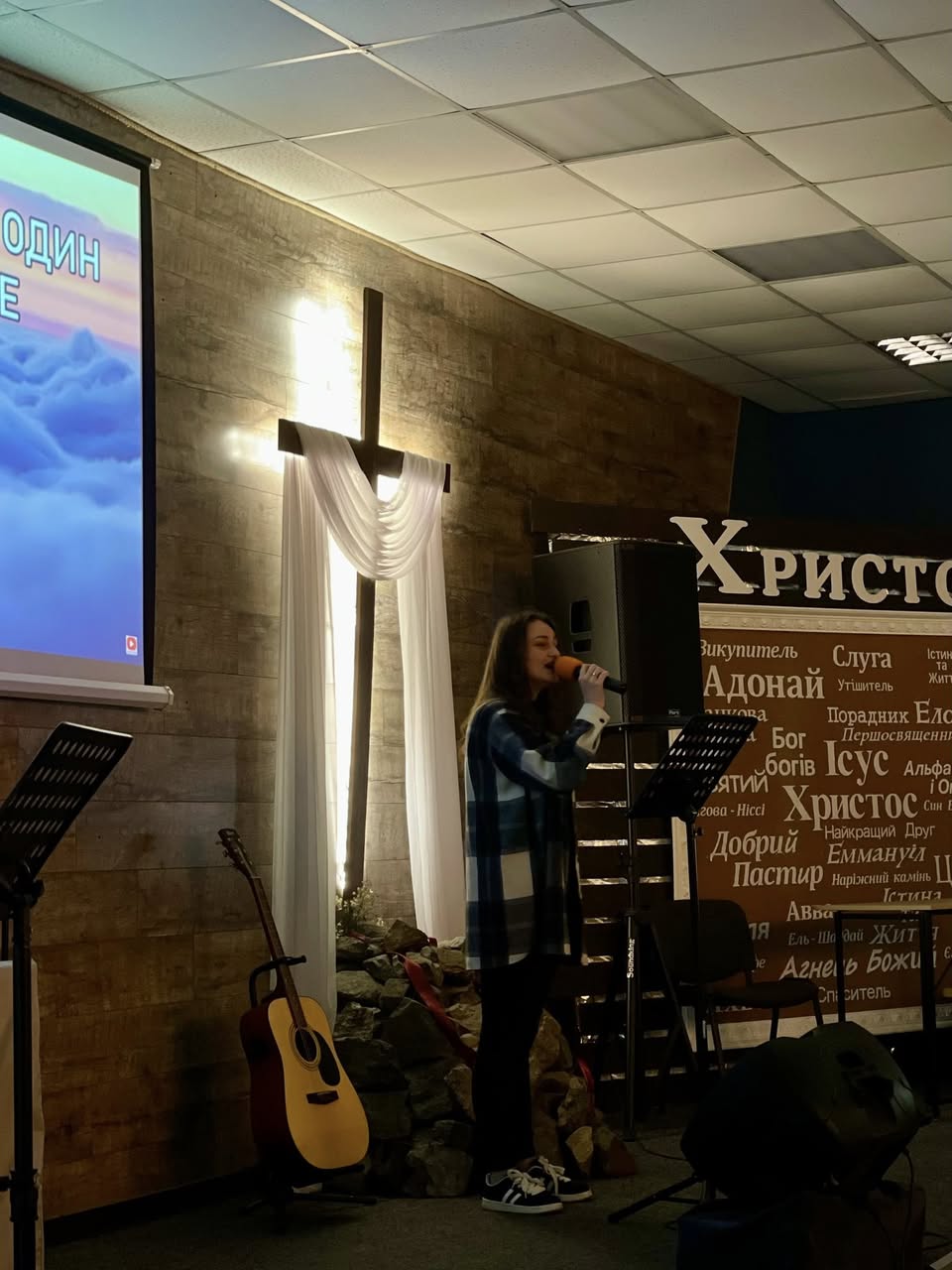 Worship Singer By A Cross In A Church Worship Singer By A Cross In A Church