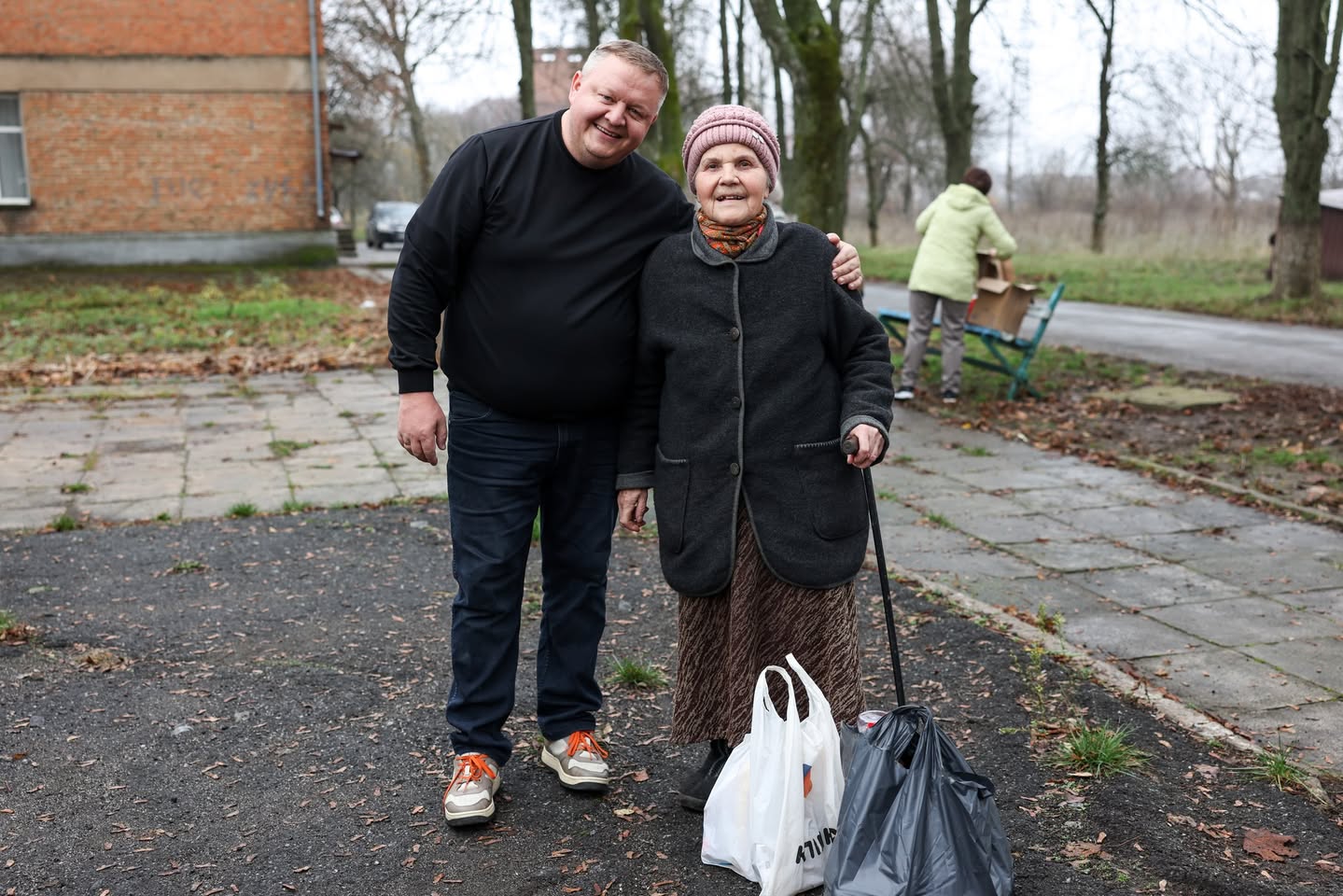 Pastor Of Uman Church With Ukrainian Elderly Woman