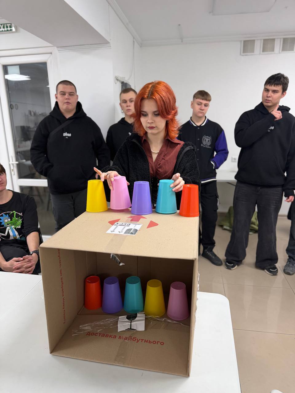 Ukrainian Girl Playing A Game With Cups
