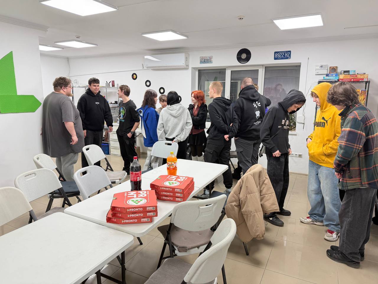 Young Ukrainians By Pizza And Soft Drinks