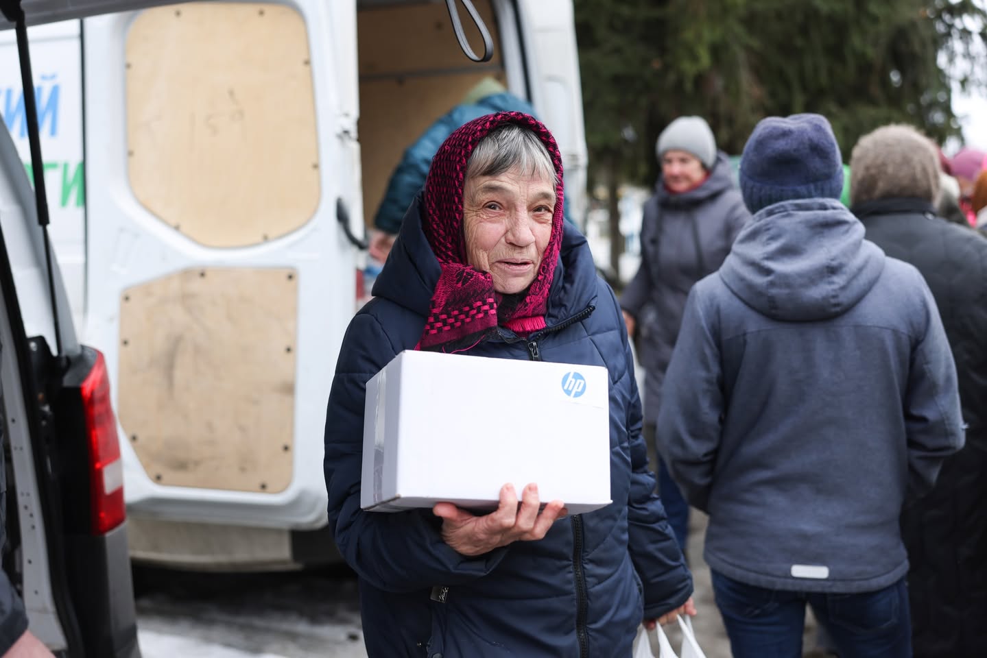 Ukrainian Elderly Woman With A Box Ukrainian Elderly Woman With A Box