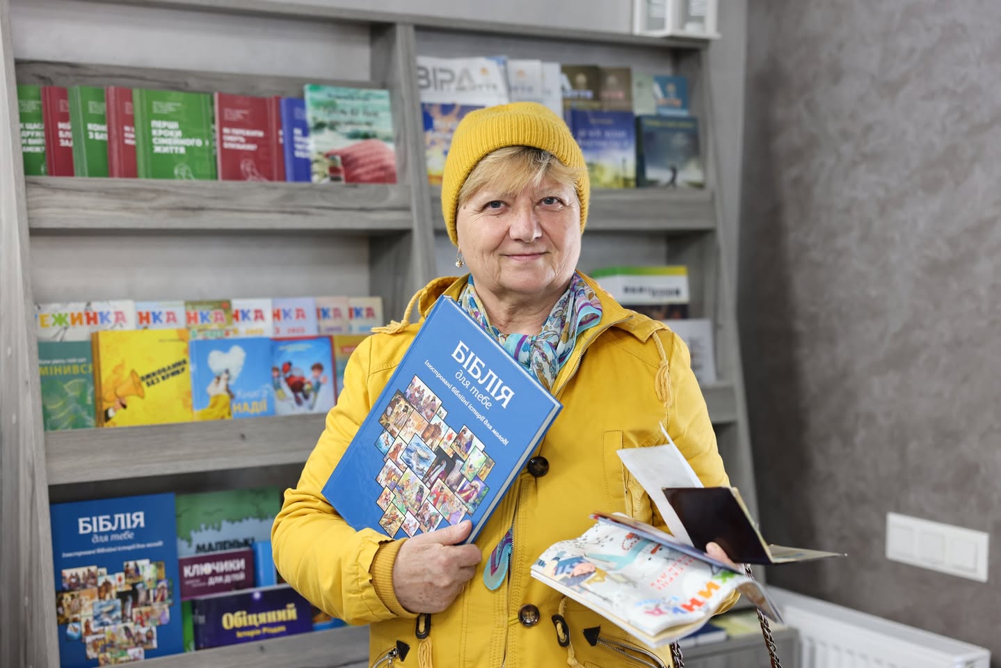 Ukrainian Elderly Woman With A Childrens Bible
