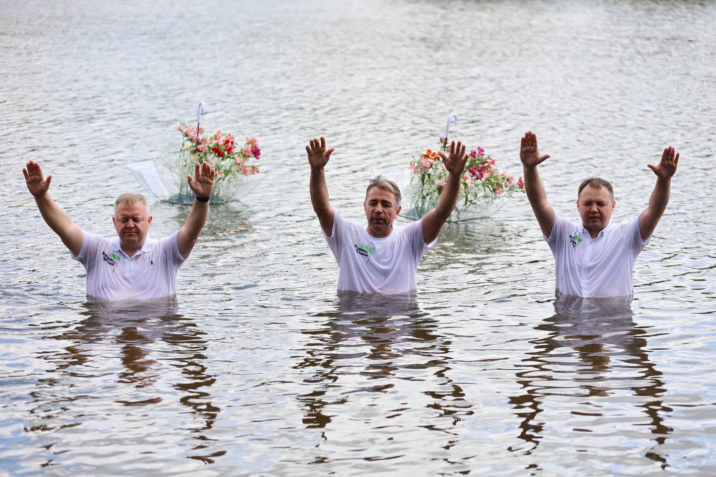 Three People Being Baptized Three People Being Baptized