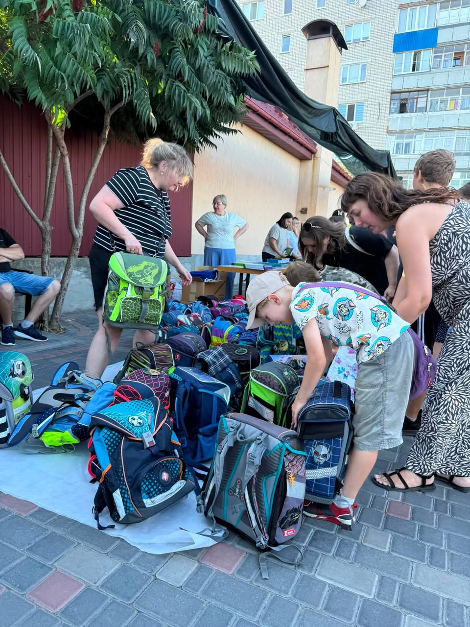 Ukrainians Going Through Backpacks